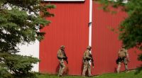 Minnesota officials describe multipronged manhunt for shooting suspect