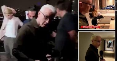 Moment CNN's Anderson Cooper forced to urgently evacuate set live on air during missile attack