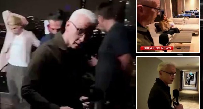 Moment CNN's Anderson Cooper forced to urgently evacuate set live on air during missile attack