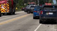 Emergency vehicles at the scene of an active shooter incident outside a church.