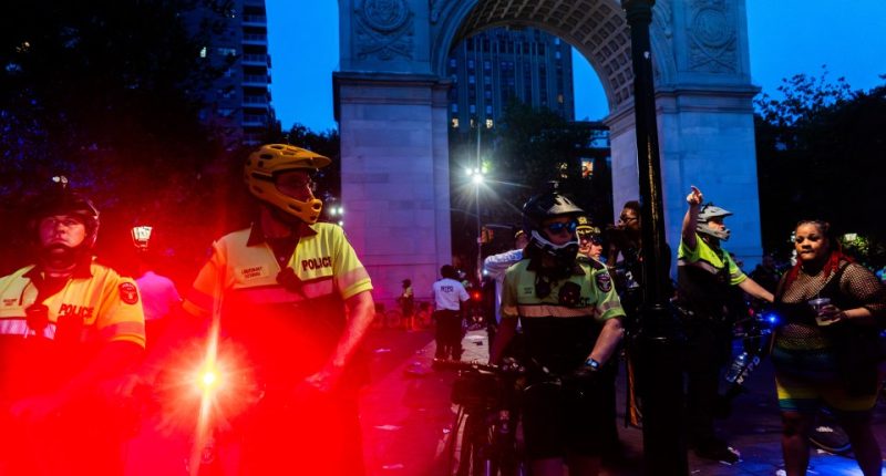 NYPD officers in Washington Square Park following the NYC Pride March.