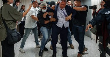 New York City Comptroller Brad Lander being arrested by ICE and FBI agents outside a federal immigration court.