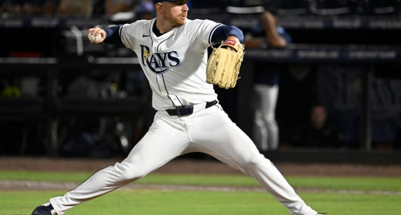 Rays pitcher carted off field and taken to hospital after foul ball into dugout hits him in face