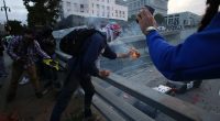 Rioters smash windows at LAPD headquarters as anti-ICE agitators clash with authorities
