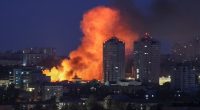 Fire and smoke rising from a building in Kyiv, Ukraine, after a Russian drone strike.