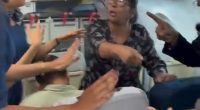 A passenger arguing with flight attendants on an airplane.