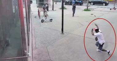 Suspect killed, officer injured in Baltimore shooting as bodycam captures cries of 'cease fire'