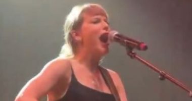 Taylor Swift makes return to stage at concert hosted by Travis Kelce