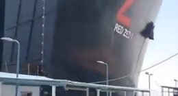A 700ft cargo ship crashing into a Suez Canal port.