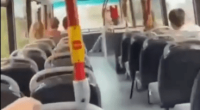 Screenshot of the inside of a bus filled with smoke.