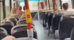 Screenshot of the inside of a bus filled with smoke.