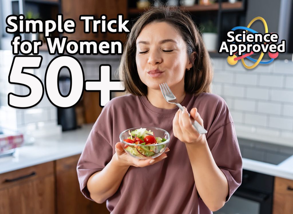 A young pretty cheerful woman is eating a salad. Healthy eating