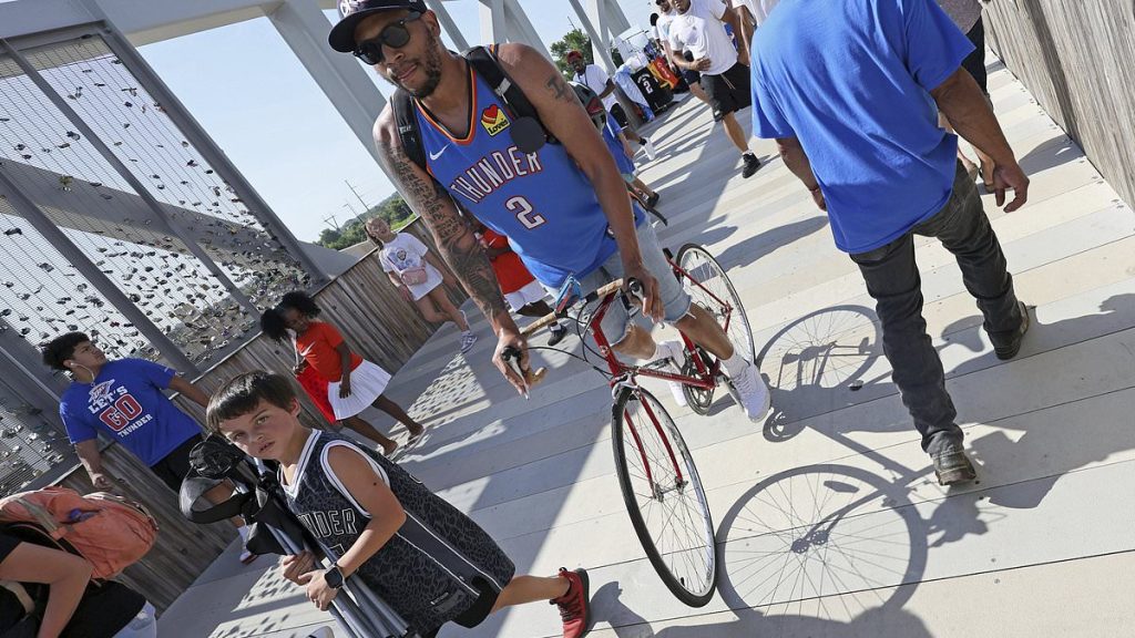 Thunder fans pack hot Oklahoma City streets to toast NBA title