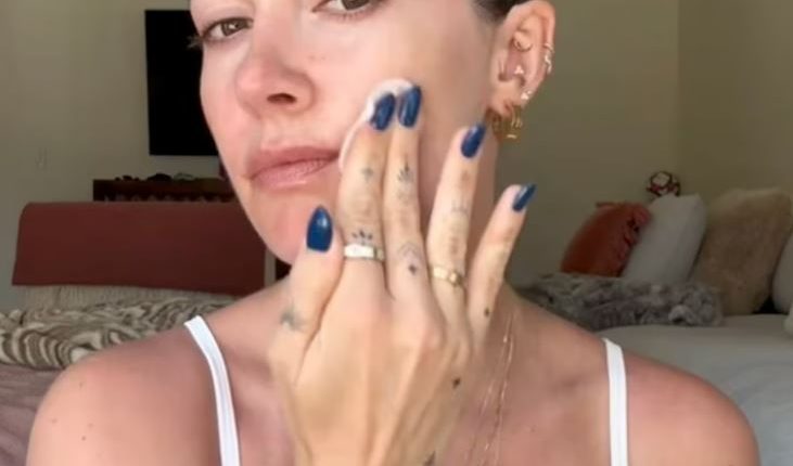 TikTok star Avery Woods applying face cream.