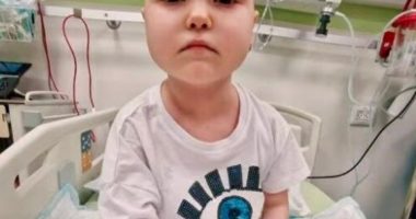 Photo of 7-year-old Anastasia Borik in a hospital bed.