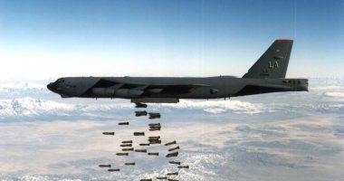A U.S. Air Force B-52 Stratofortress bomber releasing bombs.