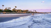 Two shark attacks reported in separate vacation hotspots as summer beach season starts