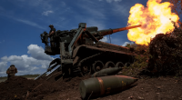 Military artillery firing.