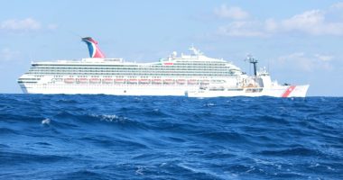 Cruise ship and Coast Guard cutter in the Gulf of Mexico.