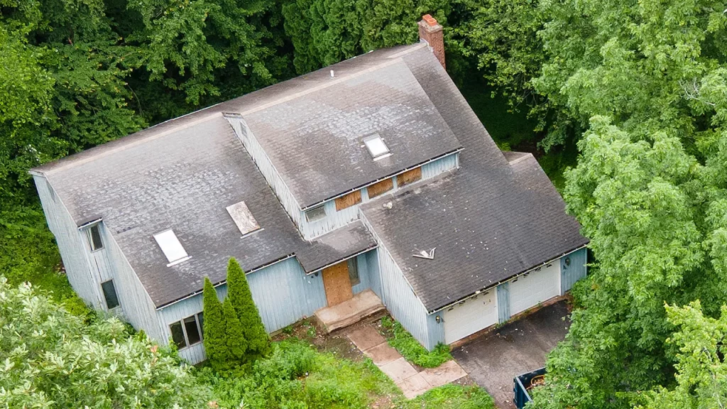 Woman missing for months found buried under piles of hoarded trash in her own home