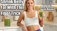 Happy woman with glass of fresh celery juice in kitchen. Women Over 50 Are