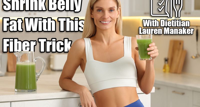 Happy woman with glass of fresh celery juice in kitchen. Women Over 50 Are