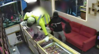 A business owner is in intensive care after his head was smashed in during a violent robbery in Queensland.﻿