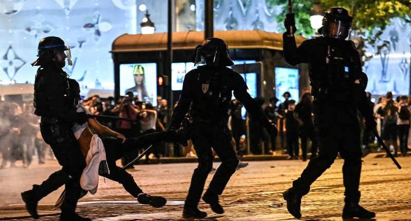 'Savage' PSG fans tear Paris apart following historic first Champions League with French riot police forced to tear gas supporters and make 131 arrest while the city of light BURNS