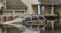 A neighborhood still flooded from Hurricane Milton prepares to have the FEMA Disaster Recover Center covert to a polling location for the general election on Monday, Nov. 4, 2024, in Ridge Manor, Fla. (AP Photo/Mike Carlson, File)