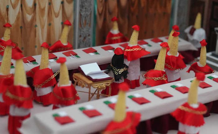 A quirky vegetable sculpture contest features a squash Donald Trump and a papal 'cornclave'