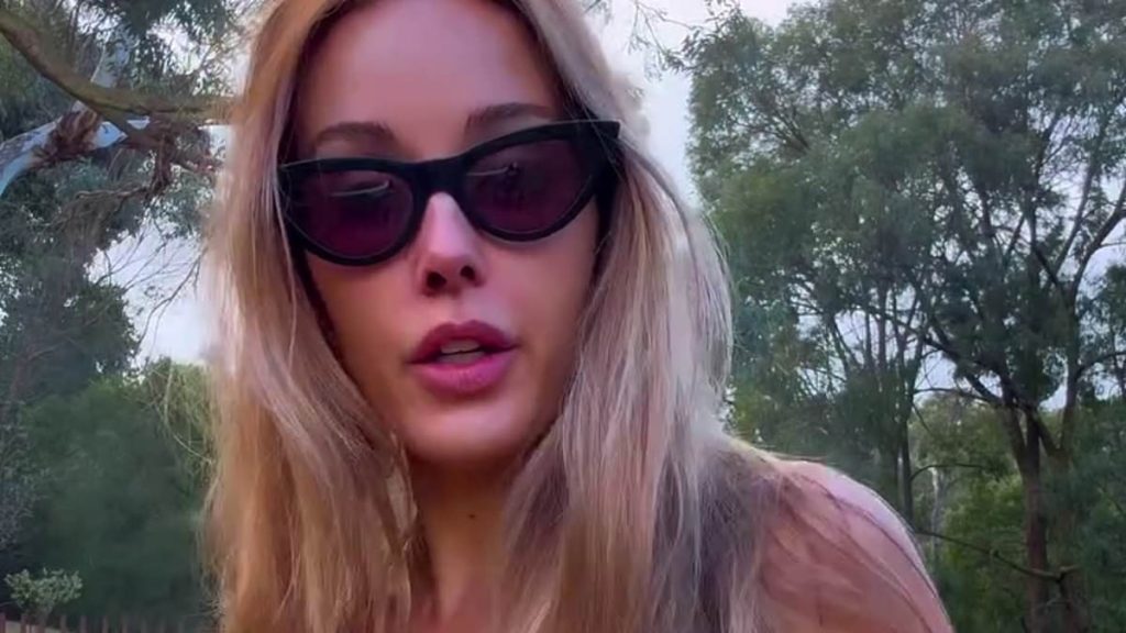 AFL WAG Bec Judd refers to herself as a 'Maori-white girl' as she shows off her tiny figure in skimpy swimwear