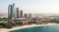 Part of Abu Dhabi, UAE with surrounding area viewed from the helicopter. Many details are visible in the image.