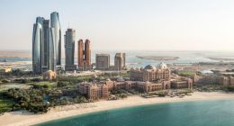 Part of Abu Dhabi, UAE with surrounding area viewed from the helicopter. Many details are visible in the image.