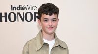 Adolescence star Owen Cooper all smiles as he collects award