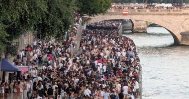 PARIS, FRANCE - JUNE 21: Thousands of people gather at the Chatelet district and on the banks of the Seine to celebrate Fete De La Musique 2025 as bands and DJ's play across Paris, France on June 21, 2025. (Photo by Luc Auffret/Anadolu via Getty Images)