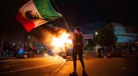 Cars torched, LA 'a mess' after 3rd night of anti-ICE protests