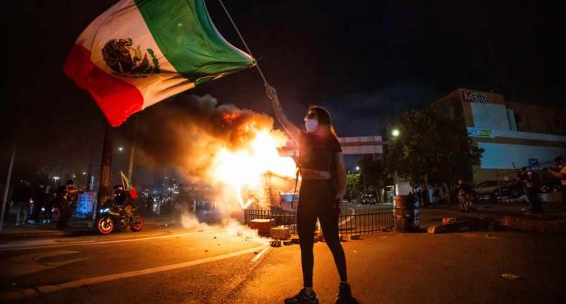 Cars torched, LA 'a mess' after 3rd night of anti-ICE protests