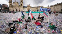 Colombian waste pickers inundate iconic Bogota square with plastic bottles to protest falling wages