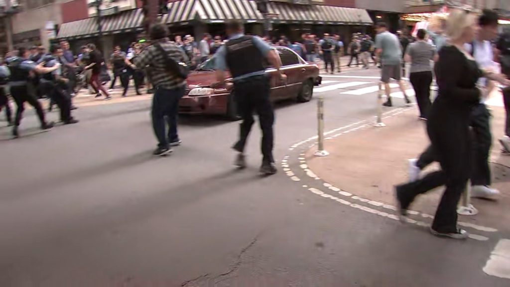 Deirdre Kemp charged with driving through large anti-ICE crowd at Chicago protest near Wabash and Monroe in the Loop: police