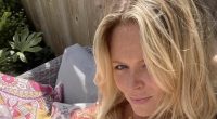 Emily Atack stuns in a bandeau swimsuit and tops up her tan