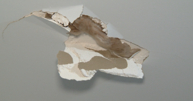 A man has been arrested after allegedly breaking a hole in an Adelaide family's roof in the early hours of the morning.