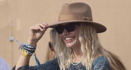 Holly Willoughby makes a rare appearance with husband Dan Baldwin as she opts for a chic paisley dress for the final day of sun-soaked Glastonbury