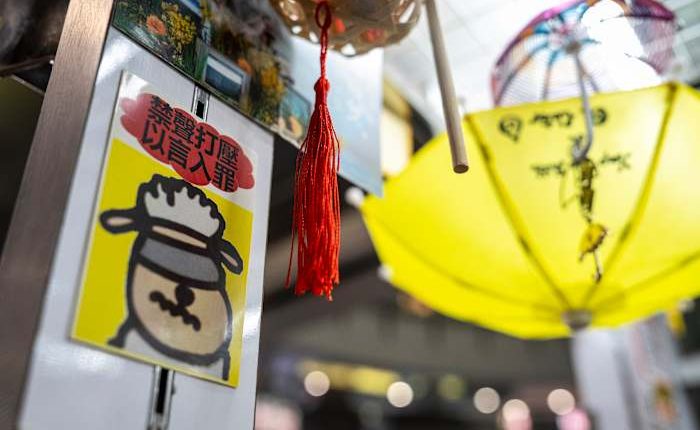 Hong Kong's security net extends beyond arrests as small businesses pressured