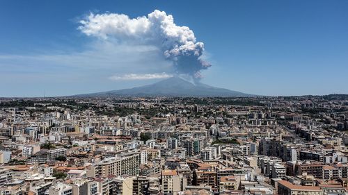 Huge eruption on Italy's Mount Etna leaves tourists fleeing volcano
