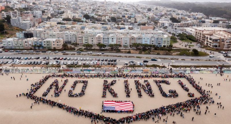 People forming message "No King!", aerial shot