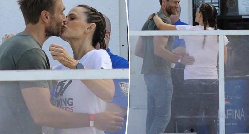 Jennifer Garner smooches boyfriend John Miller at charity event in rare PDA moment