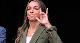 Karen Read holds up a hand sign.