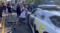 LA burns on camera: Most shocking videos of city riots show police cars pelted with rocks, van driven into crowd, a reporter getting SHOT and mindless destruction 