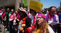 Protesters gather to denounce ICE