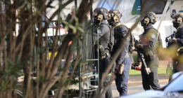 A man has been shot by police during a seige at a carvan park in Sydney's south-west.